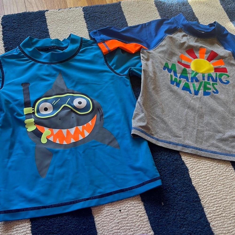 2 swim shirts/rash guards